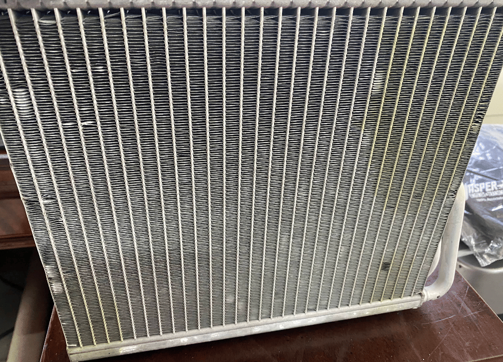 Clean automotive radiator showing quality cooling system maintenance work