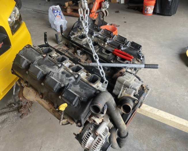 V8 engine on pallet awaiting rebuild or installation in vehicle