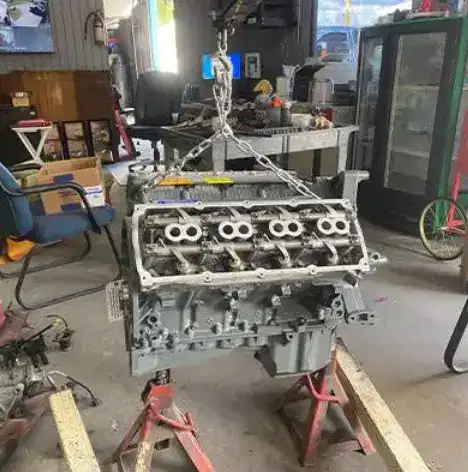 Completely rebuilt V8 engine on stand ready for vehicle installation and testing